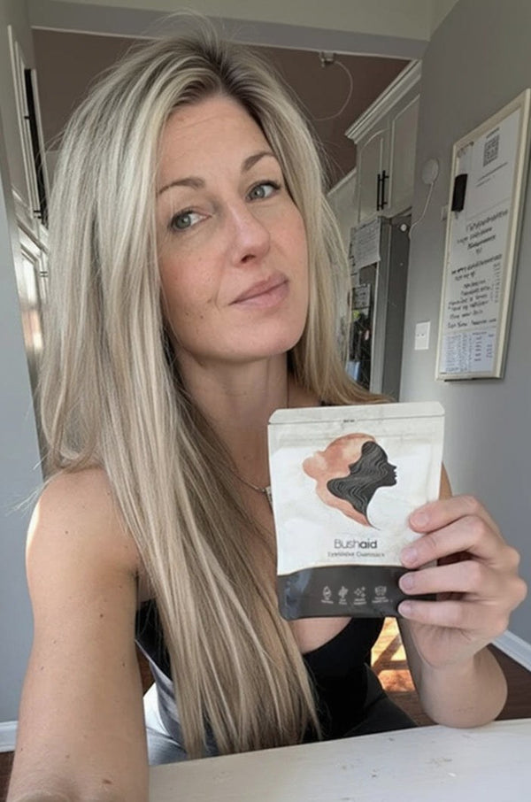 Customer holding Bushaid Feminine Balance Gummies