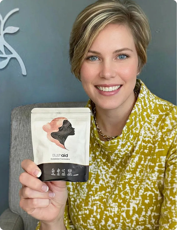 Customer holding Bushaid Feminine Balance Gummies