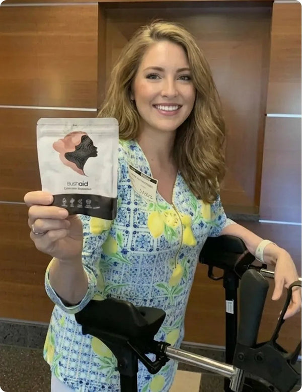 Customer holding Bushaid Feminine Balance Gummies